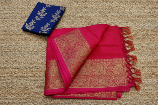 Red light weight saree with golden boarder and matching blue blouse piece